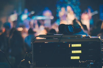 Close-up of musical instrument at music concert