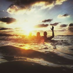 Scenic view of sea at sunset