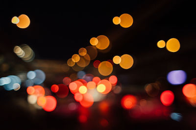 Defocused image of lights in city at night