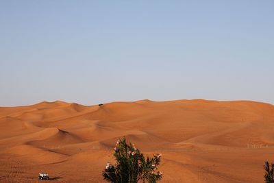 Scenic view of desert against clear sky