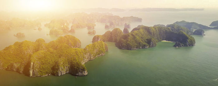 Panoramic view of trees and river against sky