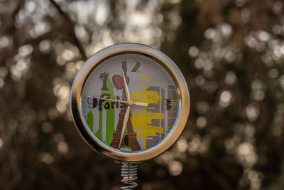 Close-up of information sign on tree