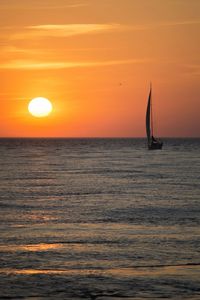 Scenic view of sea at sunset