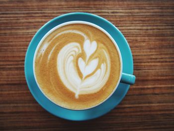 Close-up of cappuccino on table