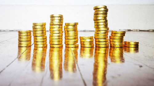Close-up of coins on table