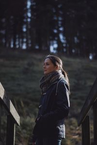 Portrait of a smiling young woman in winter