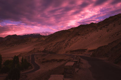 Scenic view of mountains against sky during sunset