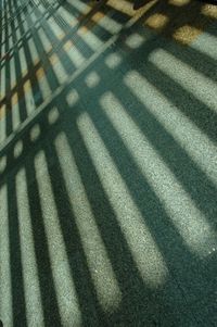 Full frame shot of shadow on tiled floor