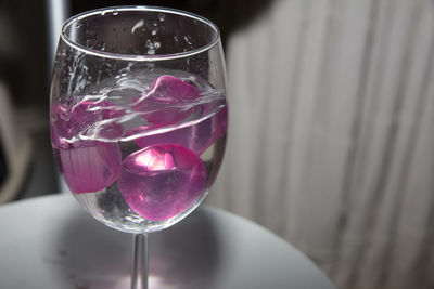 Close-up of wine glass on table