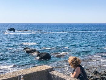 Scenic view of sea against clear sky