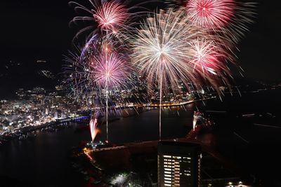 Firework display at night