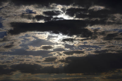 Low angle view of clouds in sky during sunset