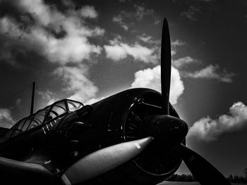 Low angle portrait of man against sky