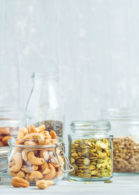 Close-up of food in jars on table