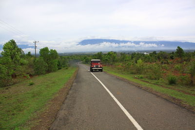 Car on road against sky