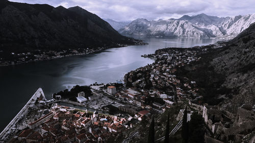 Panoramic view of illuminated mountains against sky at night