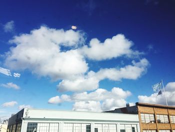 Low angle view of building against blue sky