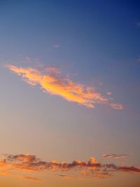 Low angle view of clouds in sky during sunset