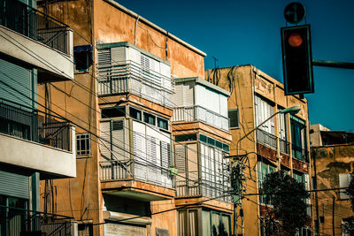 Low angle view of buildings against clear sky