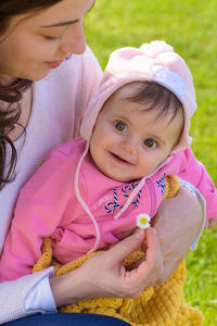 Portrait of cute girl with pink face