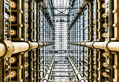 Full frame shot of metallic built structure against sky