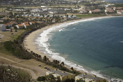 High angle view of town by sea