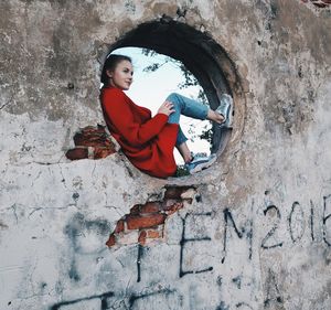 Reflection of boy on wall