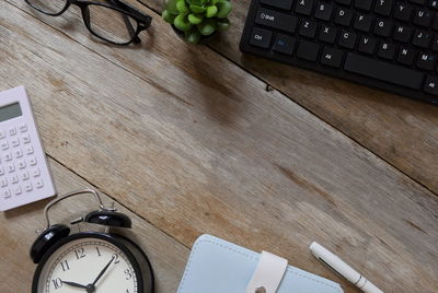 High angle view of smart phone on table