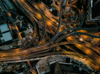 High angle view of light trails on road in city