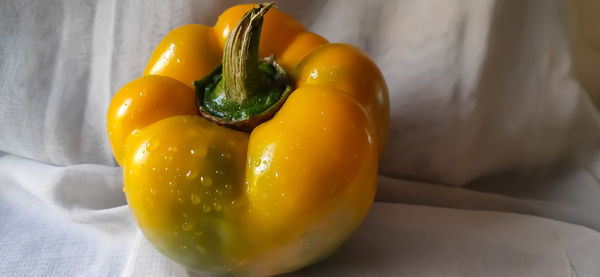 Close-up of yellow bell pepper on table