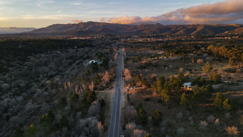 Scenic view of landscape against sky during sunset