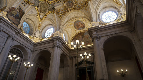 Low angle view of illuminated ceiling of building