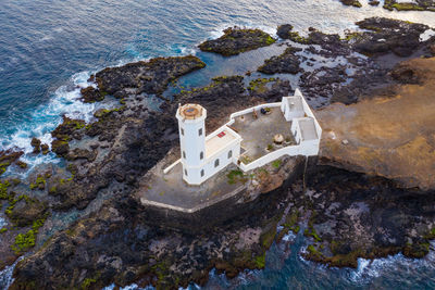 High angle view of rock formation on beach