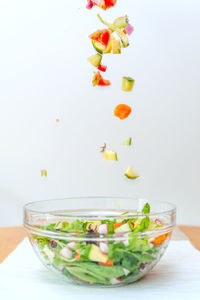 Close-up of chopped vegetables in bowl on table