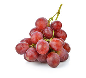 Close-up of grapes against white background