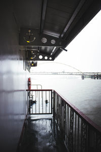 Rear view of man on bridge against sky