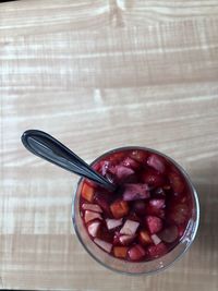 High angle view of strawberries in bowl on table