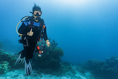 Person standing in sea