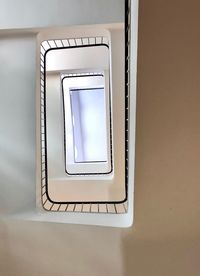 Directly below shot of spiral staircase at home