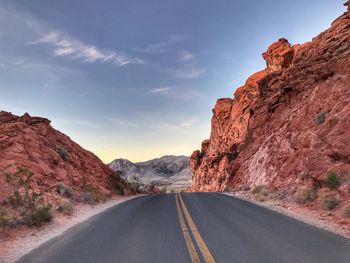 Road passing through rocky mountains