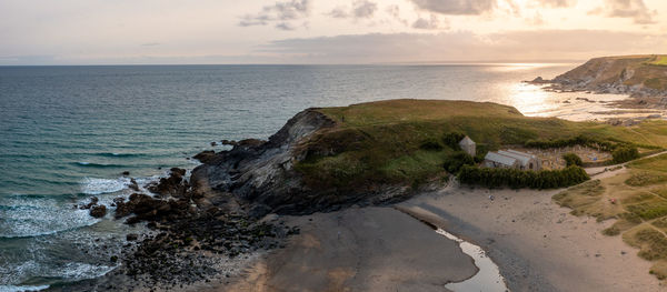 Scenic view of sea against sky during sunset