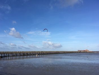 Scenic view of sea against blue sky