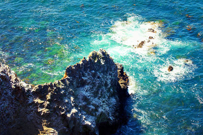 Scenic view of sea against blue sky