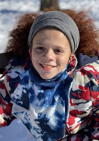 Portrait of smiling girl looking away