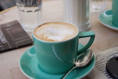 Close-up of cappuccino on table