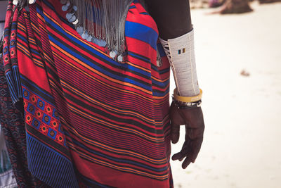 Midsection of woman in traditional clothing