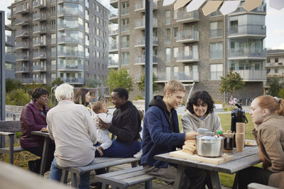 People relaxing in park