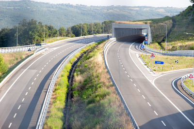 High angle view of highway by road in city