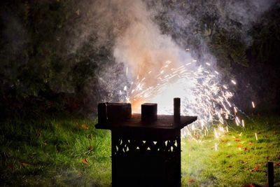 Firework display at night