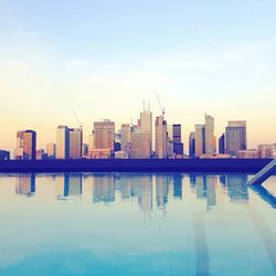 Reflection of buildings in river